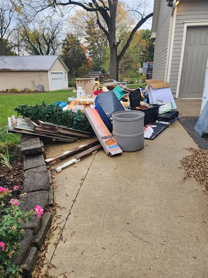 Dumpster being loaded with debris for Demolition Dumpster Rental in West Cocalico